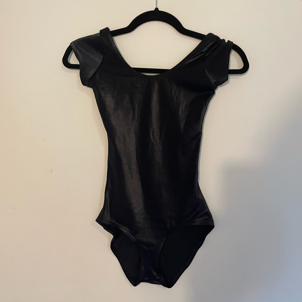 blackmilk size small bodysuit. shiny, stretchy v flattering.